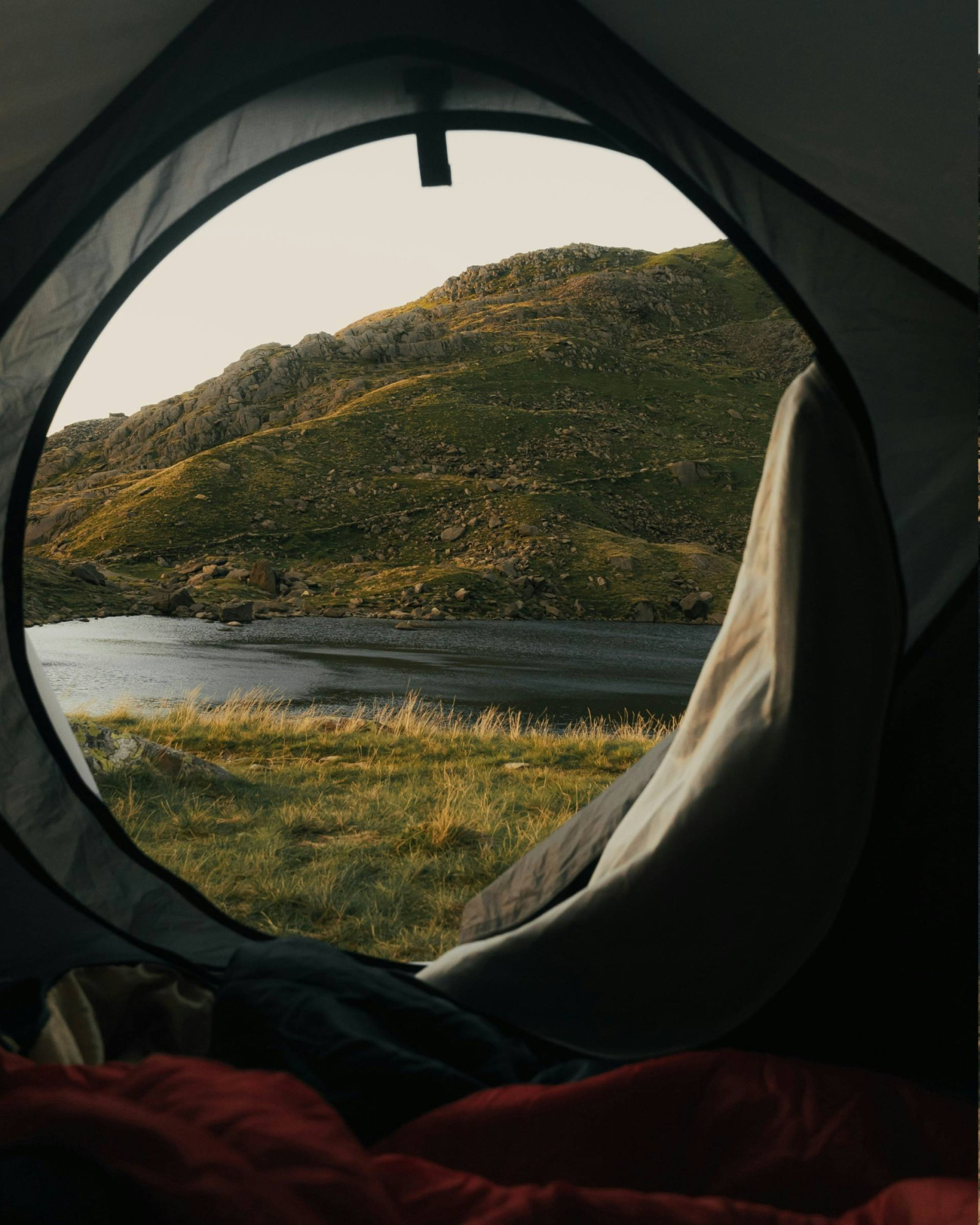 wild camping guide tent view on lake
